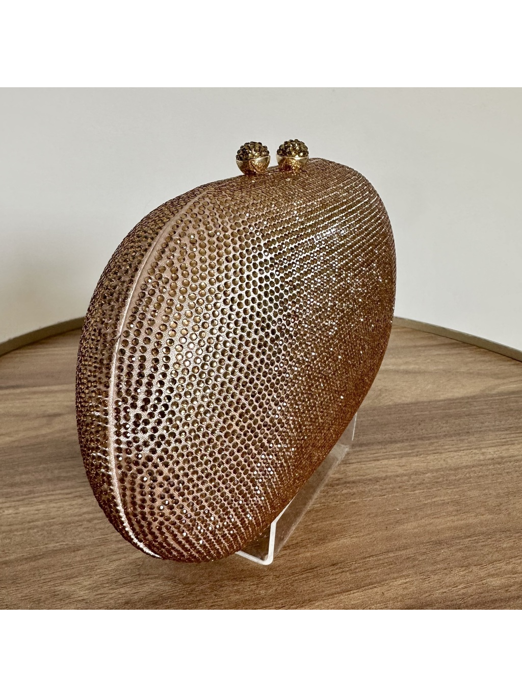 CLUTCH STRASS DOURADA OVAL