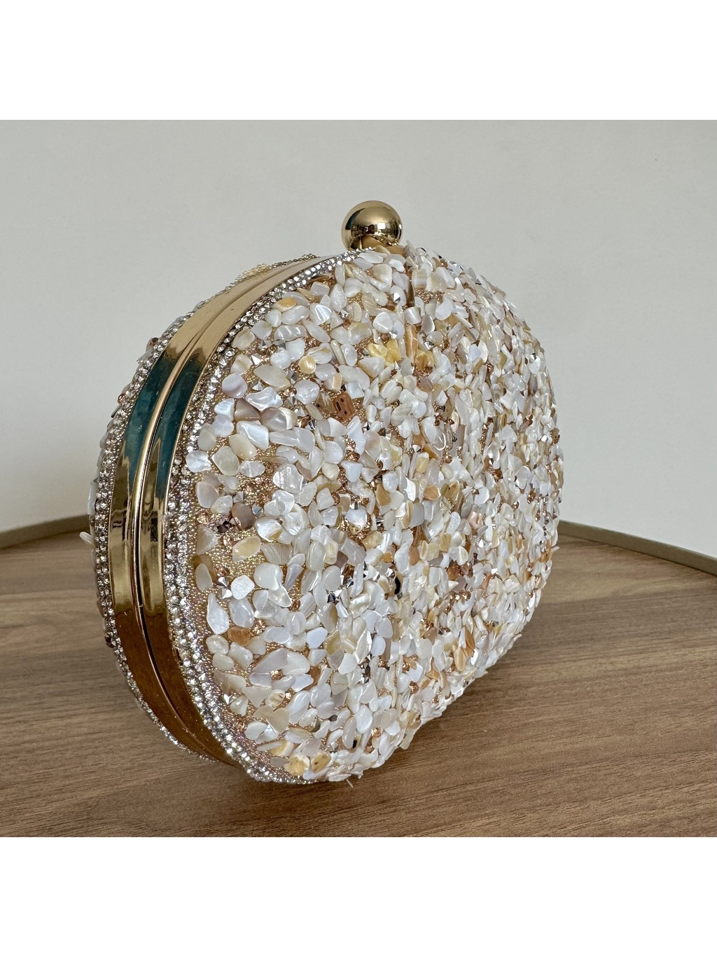 CLUTCH CASCALHO CHAMPAGNE OVAL