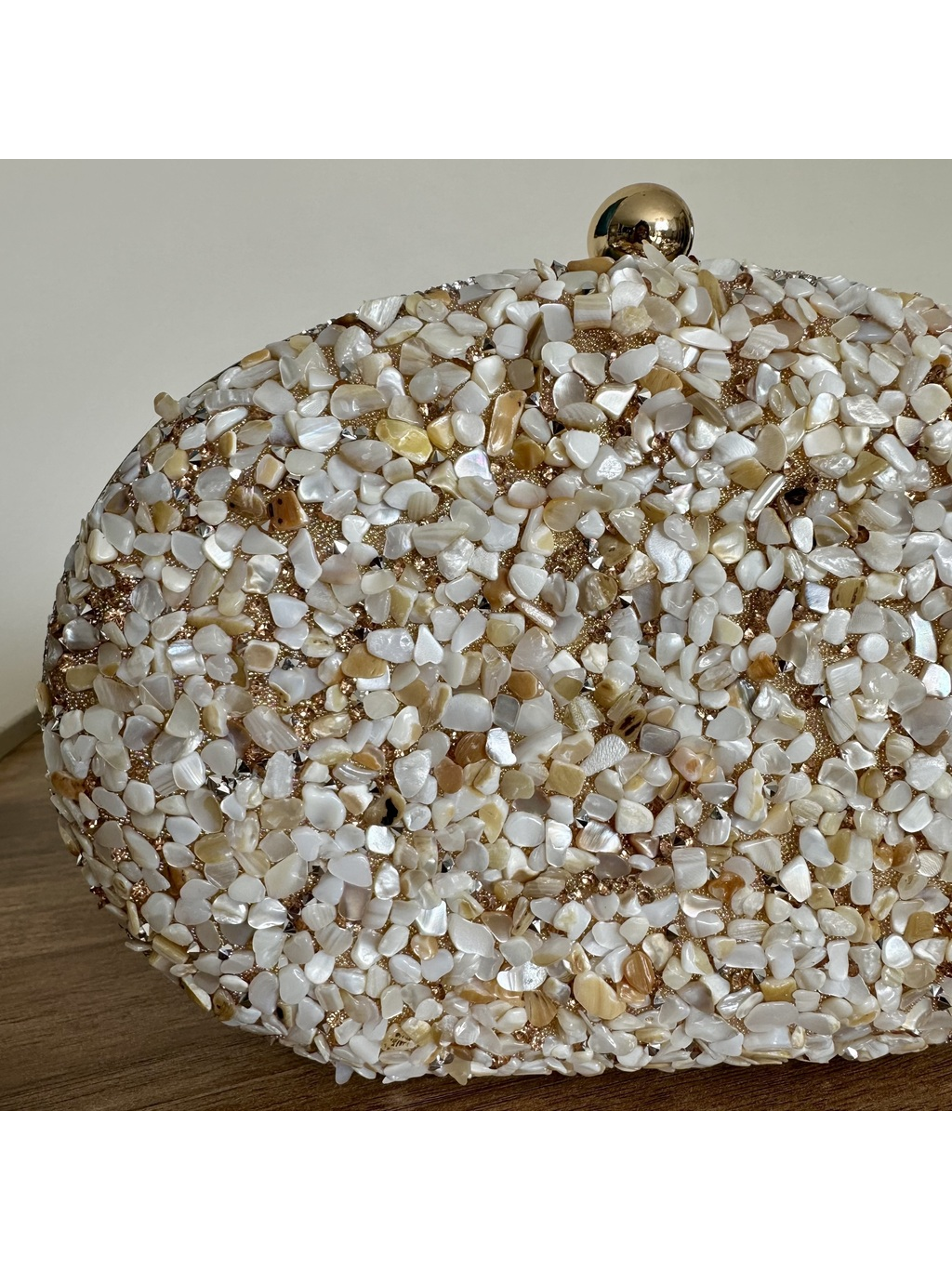 CLUTCH CASCALHO CHAMPAGNE OVAL