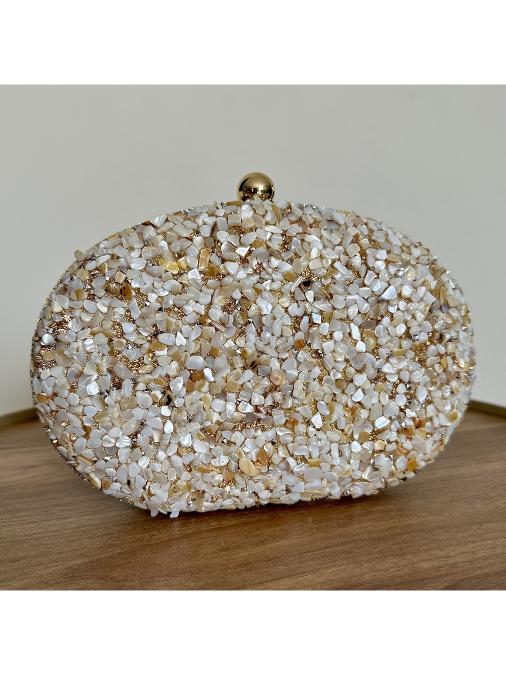 CLUTCH CASCALHO CHAMPAGNE OVAL