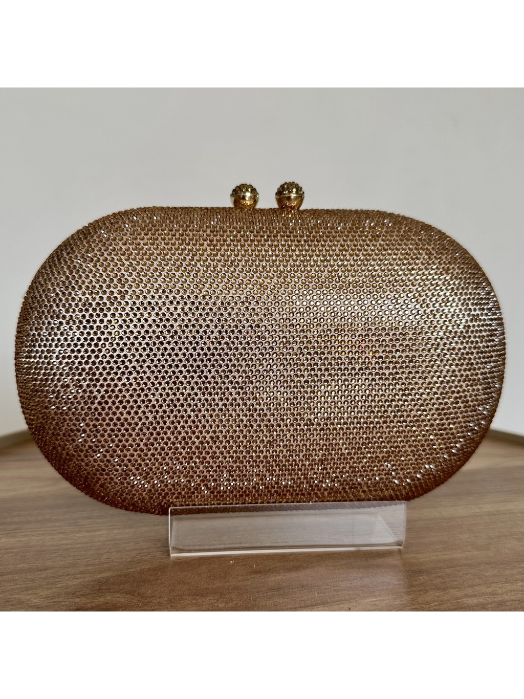 CLUTCH STRASS DOURADA OVAL